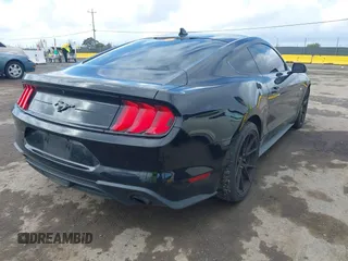 2020 Ford Mustang EcoBoost with VIN 1FA6P8THXL5177271, listed as a IAAI auction lot 41816058 with 87,226 mi miles and . Bid and sale history available at DreamBid. Image 4.