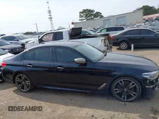 2018 BMW 5 Series M550i xDrive with VIN WBAJB9C50JB036400, listed as a IAAI auction lot 41464278 with 139,079 mi miles and . Bid and sale history available at DreamBid. Image 13.