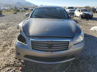 2011 Infiniti M37 with VIN JN1BY1AR7BM374320, listed as a Copart auction lot 77794534 with 191,821 mi miles and Salvage Title. Bid and sale history available at carsss.com. Image 5.