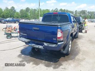 2015 Toyota Tacoma with VIN 3TMLU4EN1FM187705, listed as a IAAI auction lot 42119222 with 115,471 mi miles and . Bid and sale history available at DreamBid. Image 4.