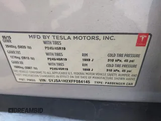2015 Tesla Model S 85D with VIN 5YJSA1H2XFF084145, listed as a IAAI auction lot 42101755 with 105,660 mi miles. Bid and sale history available at carsss.com. Image 9.