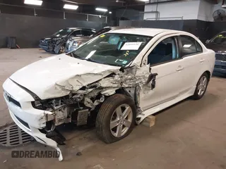 2014 Mitsubishi Lancer SE with VIN JA32V2FW1EU018927, listed as a IAAI auction lot 42059116 with 148,874 mi miles and . Bid and sale history available at carsss.com. Image 17.