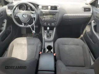 2015 Volkswagen Jetta SE with VIN 3VWD17AJ1FM349301, listed as a Copart auction lot 58963255 with 156,480 mi miles and Salvage title. Bid and sale history available at DreamBid. Image 8.