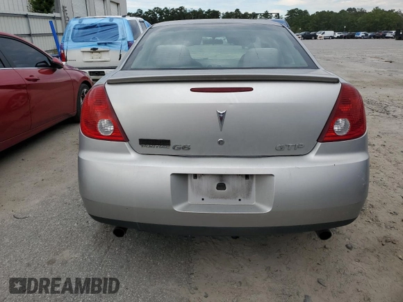 2006 Pontiac G6 GTP z VIN 1G2ZM551364162379, wystawiony jako Copart lot #73416394 z przebiegiem 218 222 mil mil oraz Szkoda całkowita • Salvage title. Historia ofert i sprzedaży dostępna na DreamBid. Obrazek 6.