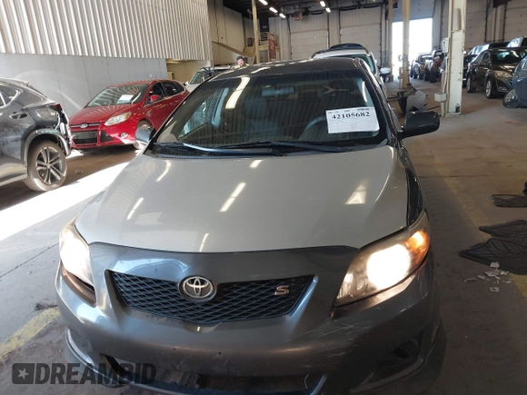 2010 Toyota Corolla with VIN 1NXBU4EE2AZ199308, listed as a IAAI auction lot 42105682 with 206,800 mi miles and . Bid and sale history available at DreamBid. Image 12.