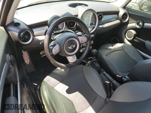 2010 MINI Hardtop S with VIN WMWMF7C53ATZ34487, listed as a Copart auction lot 55308605 with 128,759 mi miles and Clean title. Bid and sale history available at DreamBid. Image 8.