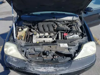 2005 Mercury Sable LS z VIN 1MEHM55S95A632753, wystawiony jako IAAI lot #42865580 z przebiegiem 168 420 mil mil oraz . Historia ofert i sprzedaży dostępna na DreamBid. Obrazek 10.