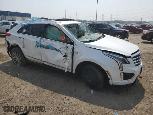 2017 Cadillac XT5 Luxury FWD with VIN 1GYKNBRS2HZ296859, listed as a Copart auction lot 64982445 with 30,765 mi miles and Salvage title. Bid and sale history available at DreamBid. Image 4.