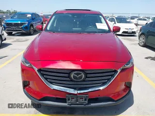 2018 Mazda CX-9 Touring with VIN JM3TCBCY6J0201556, listed as a IAAI auction lot 42285456 with 144,841 mi miles and . Bid and sale history available at DreamBid. Image 12.