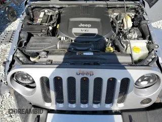 2015 Jeep Wrangler Sahara z VIN 1C4AJWBG8FL513650, wystawiony jako Copart lot #54578075 z przebiegiem 38 043 mil mil oraz Nie do naprawy • Non repairable. Historia ofert i sprzedaży dostępna na DreamBid. Obrazek 11.