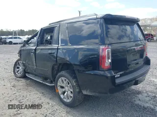 2017 GMC Yukon SLE with VIN 1GKS2AKC6HR351197, listed as a IAAI auction lot 41823017 with 106,936 mi miles and . Bid and sale history available at DreamBid. Image 3.
