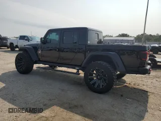 2020 Jeep Gladiator Rubicon with VIN 1C6JJTBG2LL166964, listed as a Copart auction lot 58041945 with 62,716 mi miles and Salvage title. Bid and sale history available at DreamBid. Image 2.