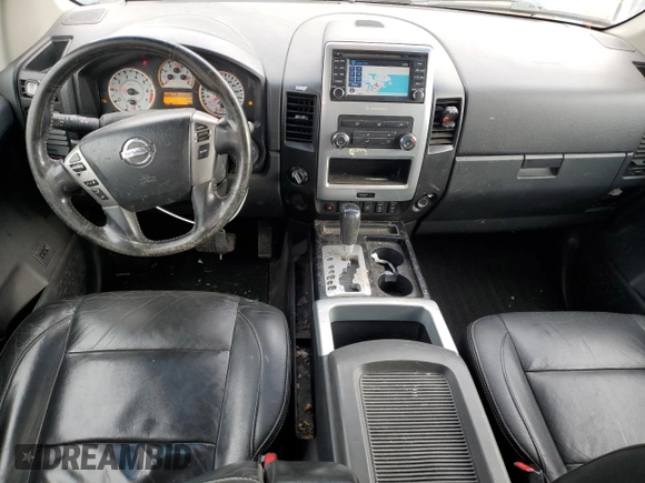 2013 Nissan Titan Pro-4X with VIN 1N6AA0ECXDN314703, listed as a Copart auction lot 49507105 with 287,763 mi miles and Salvage title. Bid and sale history available at DreamBid. Image 8.