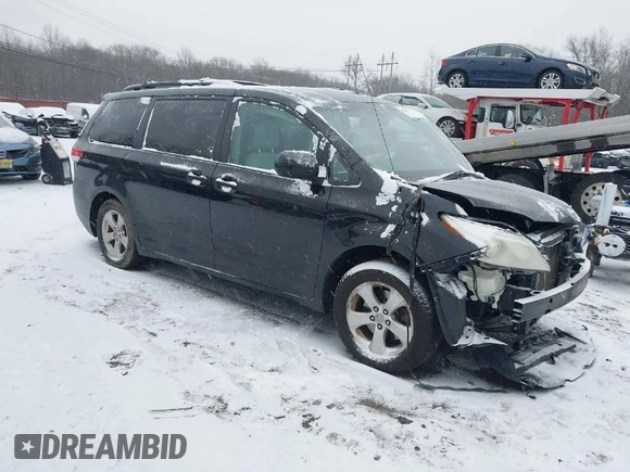 2011 Toyota Sienna LE AAS with VIN 5TDKK3DC3BS113594, listed as a IAAI auction lot 41236977 with 166,156 mi miles. Bid and sale history available at carsss.com. Image 1.