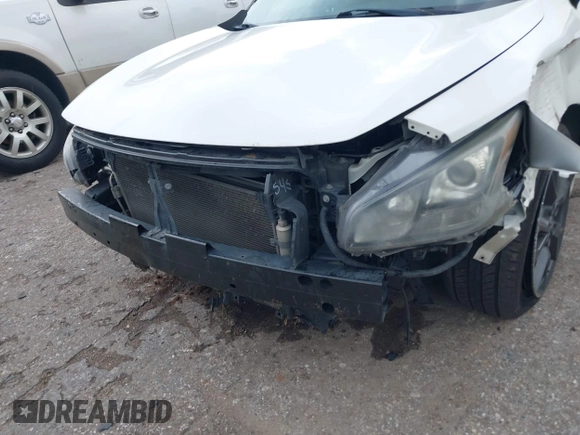 2014 Nissan Maxima S with VIN 1N4AA5AP6EC908751, listed as a IAAI auction lot 42624511 with 141,544 mi miles and . Bid and sale history available at DreamBid. Image 6.