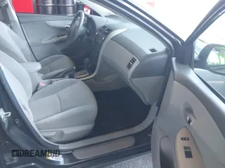 2010 Toyota Corolla with VIN 2T1BU4EE2AC223494, listed as a IAAI auction lot 40296069 with 141,817 mi miles. Bid and sale history available at carsss.com. Image 5.