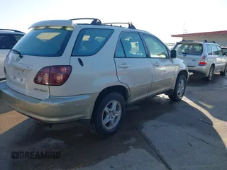 1999 Lexus RX 300 Luxury SUV with VIN JT6GF10U2X0025988, listed as a IAAI auction lot 41760039 with 248,121 mi miles. Bid and sale history available at carsss.com. Image 4.