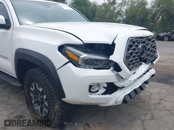 2023 Toyota Tacoma SR with VIN 3TMCZ5AN1PM556299, listed as a IAAI auction lot 42344160 with 42,338 mi miles and . Bid and sale history available at DreamBid. Image 18.