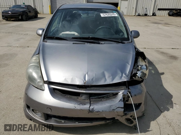 2007 Honda Fit Sport z VIN JHMGD38657S035465, wystawiony jako Copart lot #57635245 z przebiegiem 184 627 mil mil oraz Szkoda całkowita • Salvage title. Historia ofert i sprzedaży dostępna na DreamBid. Obrazek 5.