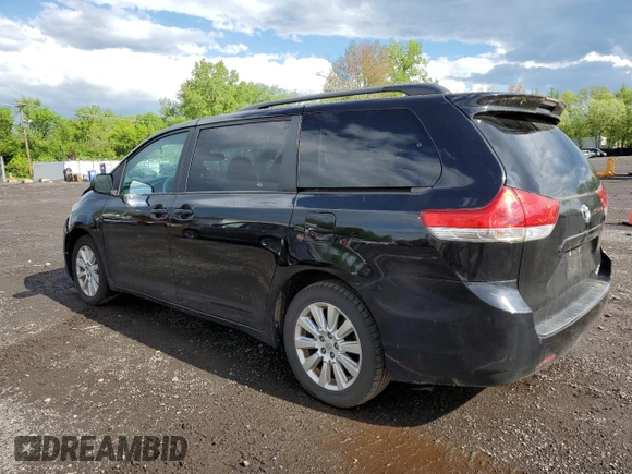 2014 Toyota Sienna Limited z VIN 5TDDK3DC5ES086024, wystawiony jako Copart lot #56299555 z przebiegiem 136 876 mil mil oraz Szkoda całkowita • Salvage title. Historia ofert i sprzedaży dostępna na DreamBid. Obrazek 2.