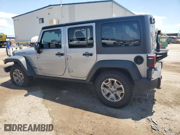 2014 Jeep Wrangler Unlimited Rubicon with VIN 1C4HJWFG1EL241014, listed as a Copart auction lot 63948655 with 165,650 mi miles and Salvage title. Bid and sale history available at DreamBid. Image 2.