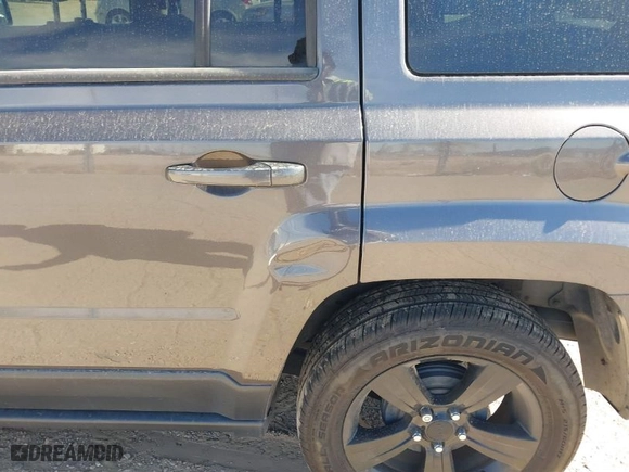2015 Jeep Patriot Altitude Edition with VIN 1C4NJPBAXFD343353, listed as a IAAI auction lot 41534180 with 122,485 mi miles. Bid and sale history available at carsss.com. Image 12.