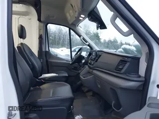 2023 Ford Transit Cargo with VIN 1FTBR1C84PKB27872, listed as a IAAI auction lot 41025498 with 6,710 mi miles and . Bid and sale history available at DreamBid. Image 5.