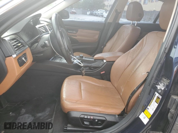 2012 BMW 3 Series 328i with VIN WBA3A5G51CNP17682, listed as a Copart auction lot 59619485 with 100,936 mi miles and Salvage title. Bid and sale history available at DreamBid. Image 7.