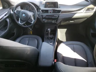 2017 BMW X1 xDrive28i with VIN WBXHT3C35H5F76415, listed as a Copart auction lot 48533495 with 66,448 mi miles and Salvage Title. Bid and sale history available at carsss.com. Image 8.