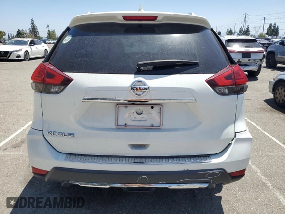 2017 Nissan Rogue S with VIN KNMAT2MT9HP579486, listed as a Copart auction lot 58251125 with 106,862 mi miles and Salvage title. Bid and sale history available at DreamBid. Image 6.