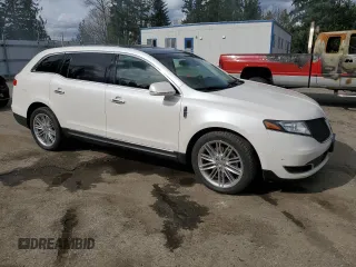 2014 Lincoln MKT EcoBoost with VIN 2LMHJ5ATXEBL58623, listed as a Copart auction lot 48222015 with 255,495 mi miles and Clean Title. Bid and sale history available at DreamBid. Image 4.