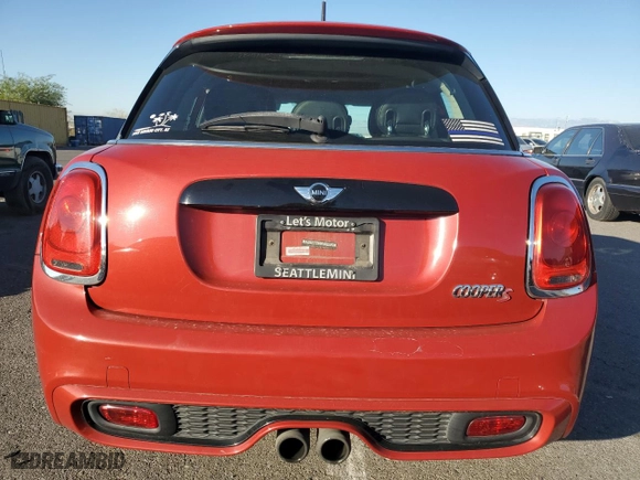 2016 MINI Cooper Hardtop 4 Door S with VIN WMWXU3C54G2B67486, listed as a Copart auction lot 74254944 with 71,031 mi miles and Salvage Title. Bid and sale history available at carsss.com. Image 6.