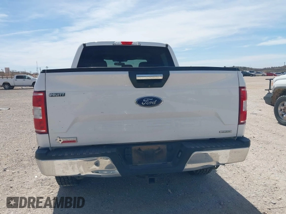 2019 Ford F-150 XL with VIN 1FTEW1E42KKE77610, listed as a IAAI auction lot 41765076 with 155,437 mi miles and . Bid and sale history available at DreamBid. Image 16.