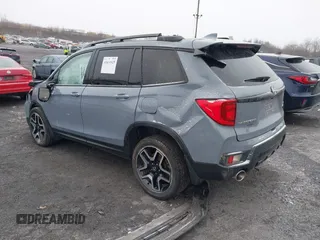 2022 Honda Passport Elite z VIN 5FNYF8H06NB015583, wystawiony jako IAAI lot #41633925 z przebiegiem 49 738 mil mil oraz . Historia ofert i sprzedaży dostępna na DreamBid. Obrazek 3.