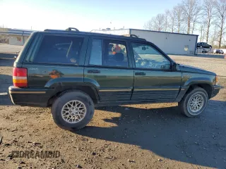 1995 Jeep Grand Cherokee Limited with VIN 1J4GZ78S7SC613568, listed as a Copart auction lot 83365584 with 184,099 mi miles and Salvage Title. Bid and sale history available at carsss.com. Image 3.