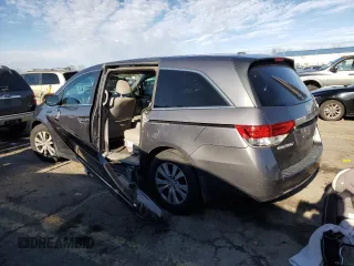 2017 Honda Odyssey SE with VIN 5FNRL5H37HB018616, listed as a Copart auction lot 87174674 with 124,367 mi miles and Salvage Title. Bid and sale history available at carsss.com. Image 2.