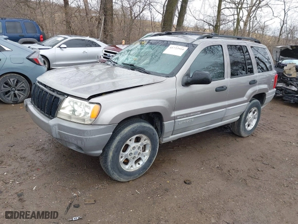 1999 Jeep Grand Cherokee Laredo with VIN 1J4GW58N0XC748809, listed as a IAAI auction lot 41722910 with 201,407 mi miles. Bid and sale history available at carsss.com. Image 2.