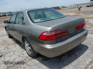 2000 Honda Accord SE z VIN 1HGCG5673YA090469, wystawiony jako IAAI lot #42391254 z przebiegiem 140 819 mil mil oraz . Historia ofert i sprzedaży dostępna na DreamBid. Obrazek 3.