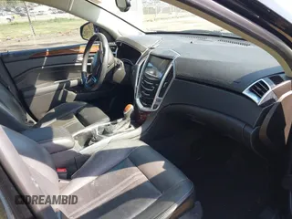 2016 Cadillac SRX Luxury Collection with VIN 3GYFNEE38GS533898, listed as a IAAI auction lot 41898772 with 187,101 mi miles. Bid and sale history available at carsss.com. Image 5.