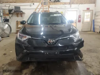 2018 Toyota RAV4 LE with VIN 2T3BFREV2JW846661, listed as a Copart auction lot 51097155 with 68,608 mi miles and Salvage Title. Bid and sale history available at carsss.com. Image 5.