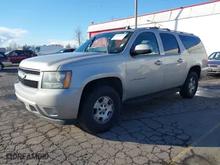 2009 Chevrolet Suburban LT w/2LT with VIN 1GNFC26099R177554, listed as a IAAI auction lot 38664519 with 311,063 mi miles. Bid and sale history available at carsss.com. Image 2.
