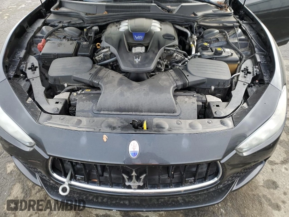 2015 Maserati Ghibli S Q4 with VIN ZAM57RTA8F1150575, listed as a Copart auction lot 38179884 with 59,174 mi miles. Bid and sale history available at carsss.com. Image 13.