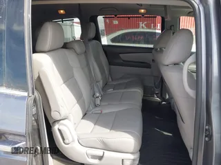 2014 Honda Odyssey Touring with VIN 5FNRL5H91EB093540, listed as a IAAI auction lot 41887412 with 202,076 mi miles and . Bid and sale history available at DreamBid. Image 8.