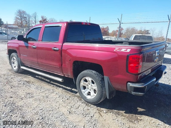 2015 Chevrolet Silverado 1500 LT with VIN 3GCUKREC6FG185646, listed as a IAAI auction lot 40702001 with 187,304 mi miles. Bid and sale history available at carsss.com. Image 3.