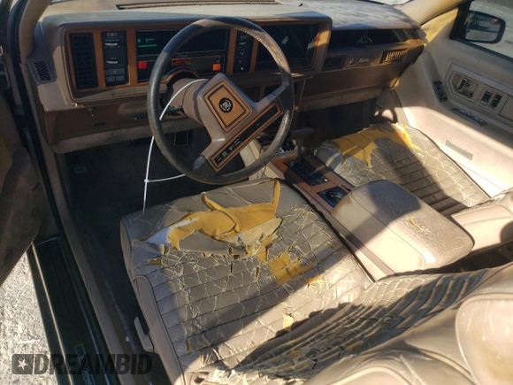 1988 Cadillac Eldorado with VIN 1G6EL1153JU612185, listed as a Copart auction lot 83786144 with 133,882 mi miles and Salvage Title. Bid and sale history available at DreamBid. Image 8.