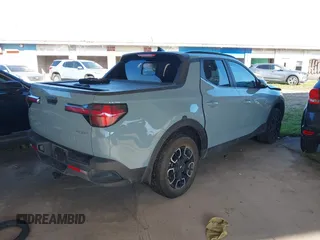 2022 Hyundai Santa Cruz SEL Premium z VIN 5NTJDDAF3NH012433, wystawiony jako IAAI lot #41922462 z przebiegiem 72 880 mil mil oraz . Historia ofert i sprzedaży dostępna na DreamBid. Obrazek 4.