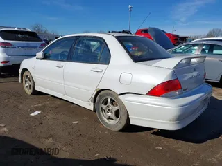 2003 Mitsubishi Lancer OZ-Rally with VIN JA3AJ86E13U100350, listed as a IAAI auction lot 41584874 with 244,945 mi miles. Bid and sale history available at carsss.com. Image 3.
