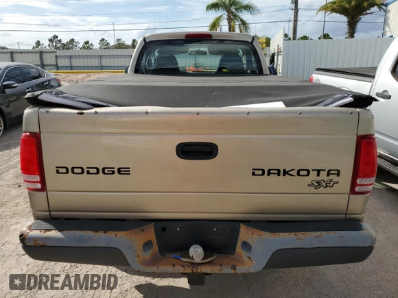 2004 Dodge Dakota with VIN 1D7GG16K94S622234, listed as a Copart auction lot 79830354 with 63,401 mi miles and Salvage Title. Bid and sale history available at DreamBid. Image 6.