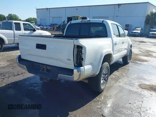 2017 Toyota Tacoma SR5 with VIN 5TFAZ5CNXHX044976, listed as a IAAI auction lot 42052922 with 149,116 mi miles and . Bid and sale history available at DreamBid. Image 4.