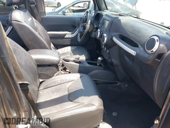 2016 Jeep Wrangler Unlimited Sahara with VIN 1C4HJWEG2GL273507, listed as a IAAI auction lot 39855004 with 87,011 mi miles and . Bid and sale history available at DreamBid. Image 5.